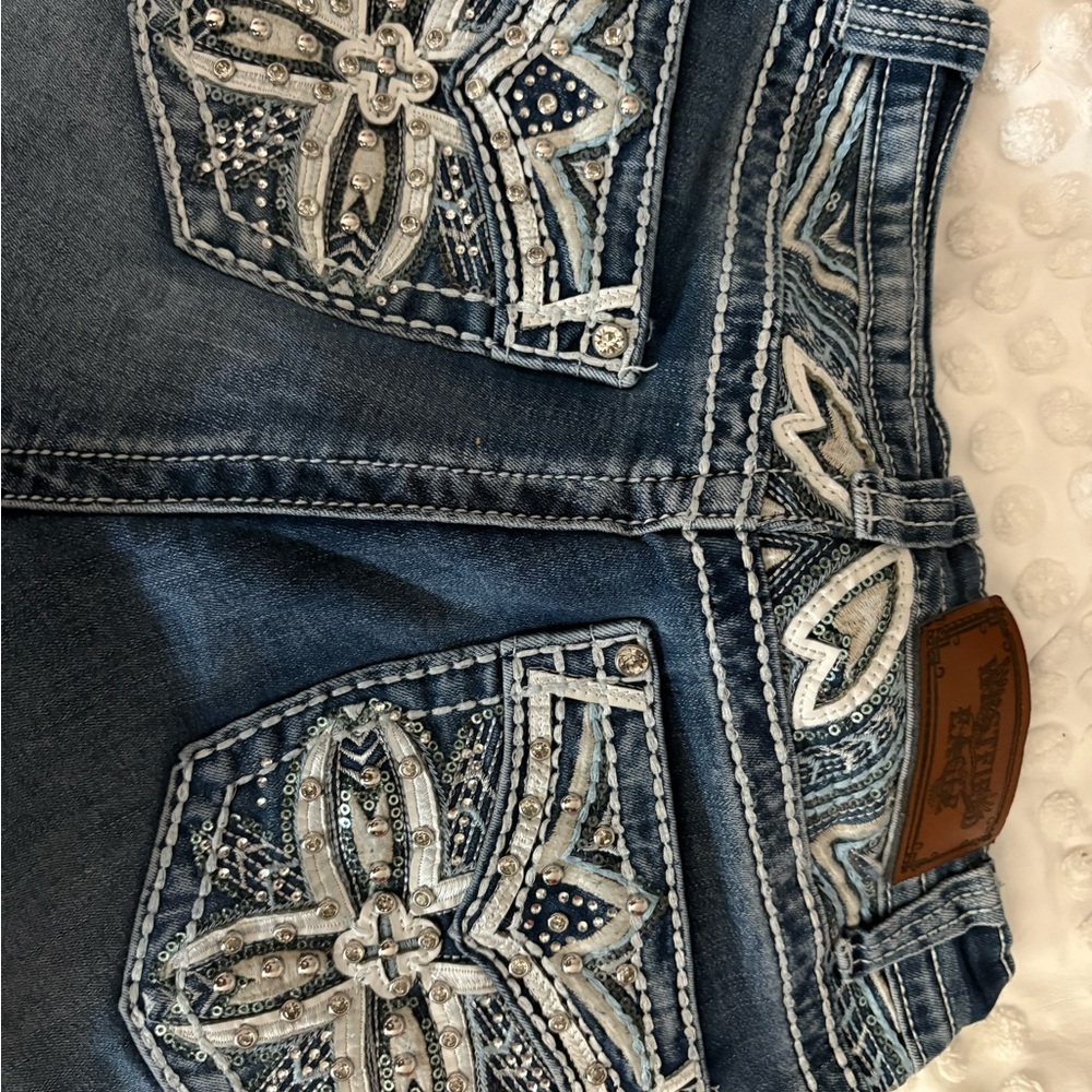 Embroidered Denim Jeans with Floral Accents